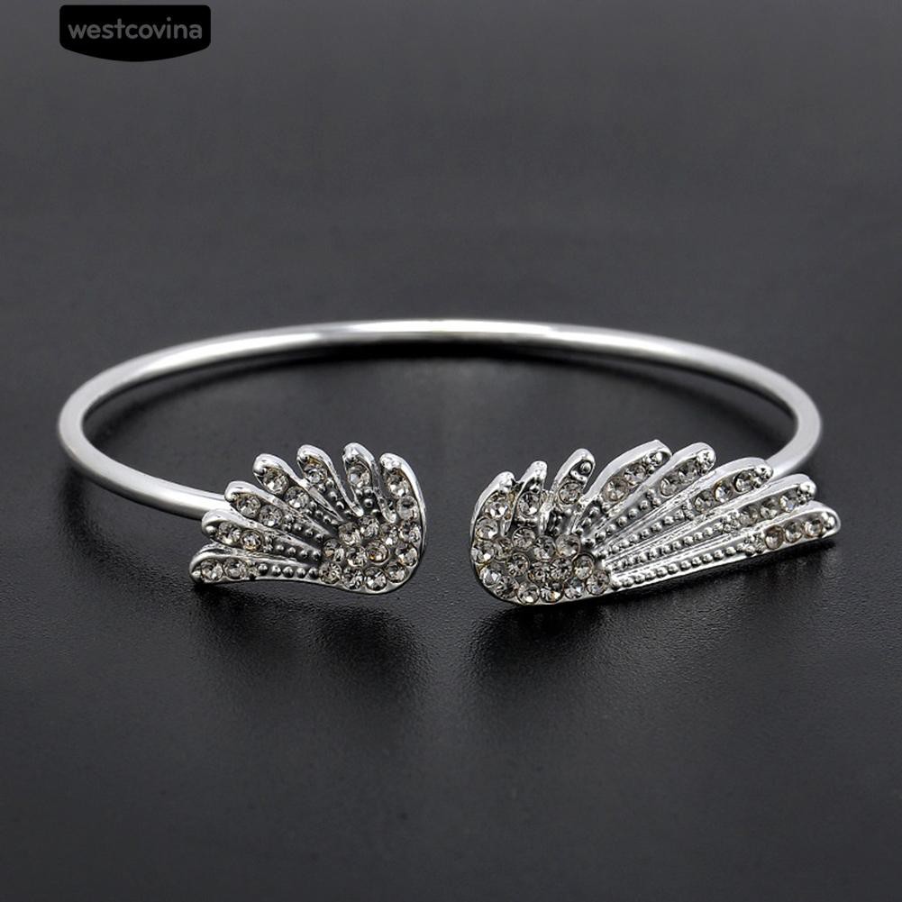 Vòng đeo tay kim loại mạ bạc kiểu cánh chim có phối đá đầy cá tính