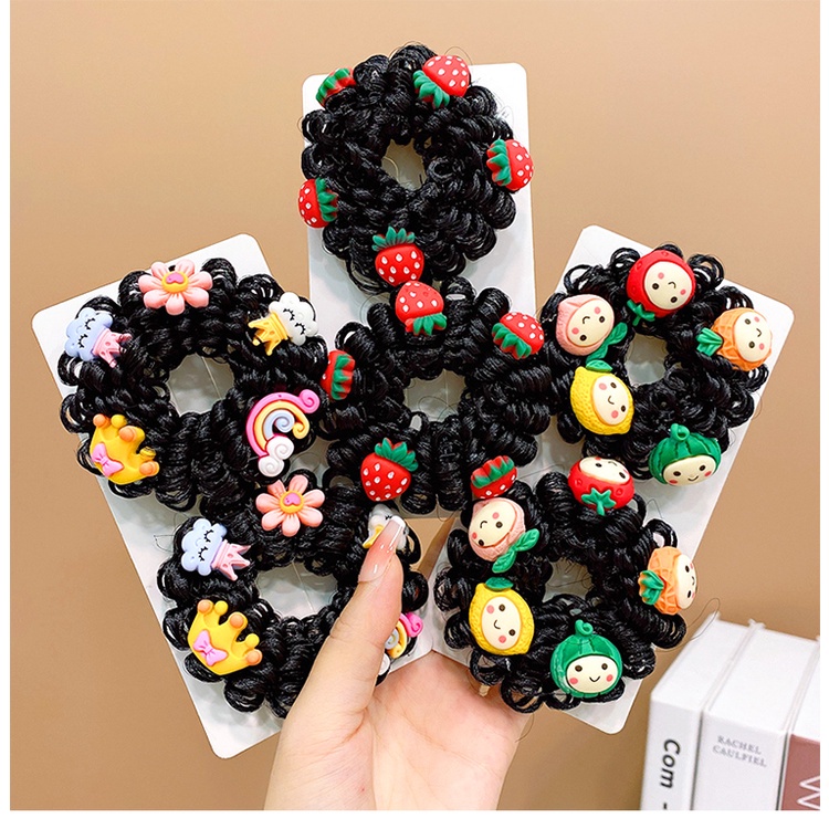 Cột tóc giả búi xoăn kèm icon cho bé gái dễ thương