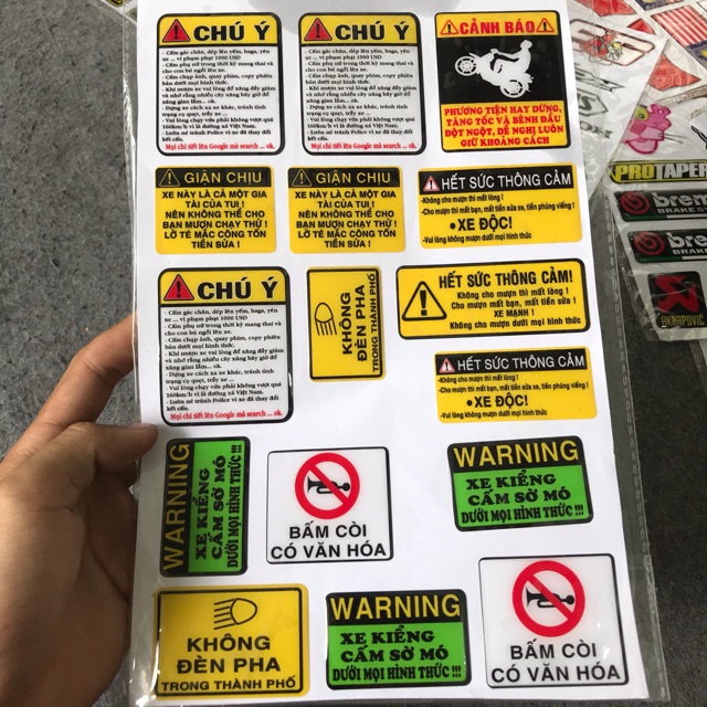 tem chú ý nổi dán xe
