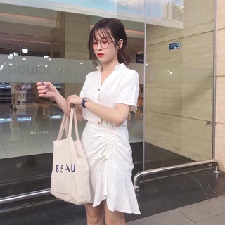 Đầm trắng cổ V nút xéo