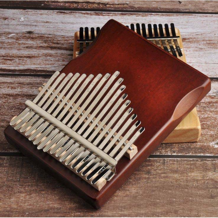 Đàn Kalimba 17 Phím Khoét Eo Màu Nâu Cầm Không Đau Tay, Giá Rẻ Cho Người Mới Tập, Full Túi, Búa, Sách, Khăn, Dán Phím