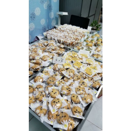 túi bánh quy , cookie hàn miệng túi 7×10 hình hoa cúc ( xấp 100 cái )