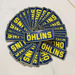Tem ohlins xanh đen 5k/2 cái. Logo ohlins vàng đen 5k/2c