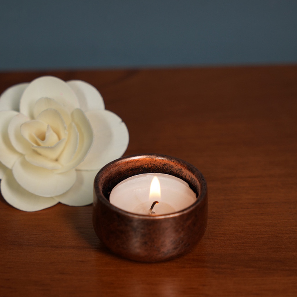 Chân nến hình mặt phật