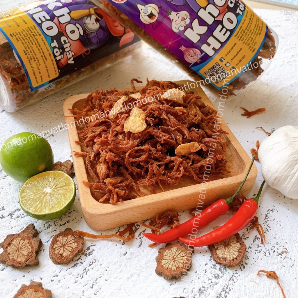 Khô heo khô lợn cháy bơ tỏi 200g LomDom food (cay vừa) đồ ăn vặt Hà Nội vừa ngon vừa rẻ | BigBuy360 - bigbuy360.vn