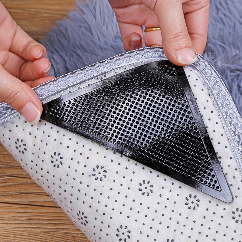 Set 4 Miếng Dán Bằng PU Hình Tam Giác Chống Trượt Màu Đen Có Thể Tái Sử Dụng Cho Thảm Lót Sàn Nhà