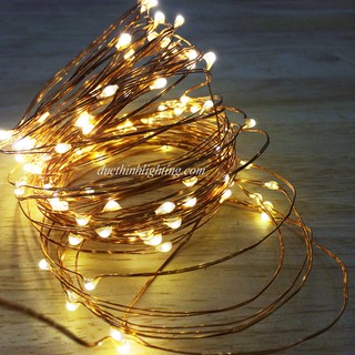 Dây đèn dài 10m gồm 100 đèn LED màu vàng nắng dùng trang trí, kèm pin