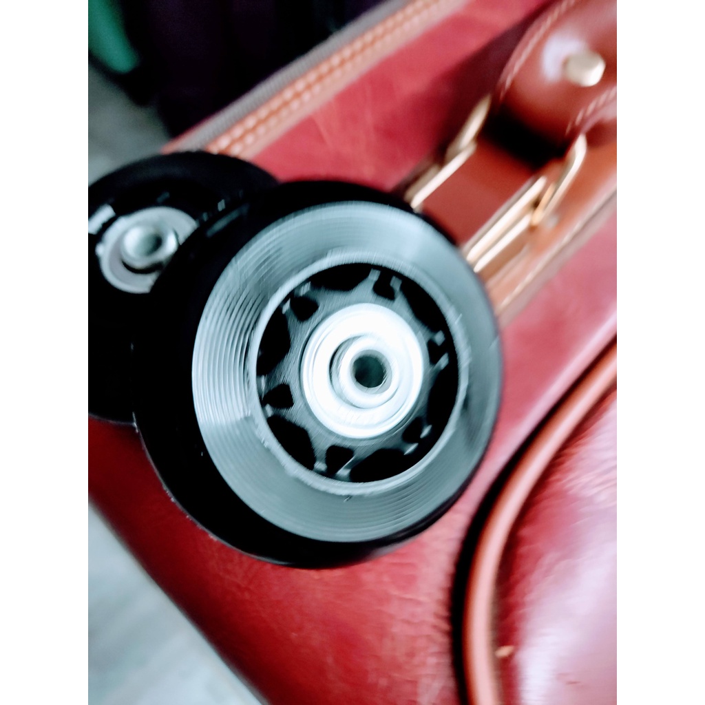 Cặp bánh xe đường kính 70mm vòng bi chất liệu TPU siêu bền dùng để thay thế cho các loại vali vải 2 bánh