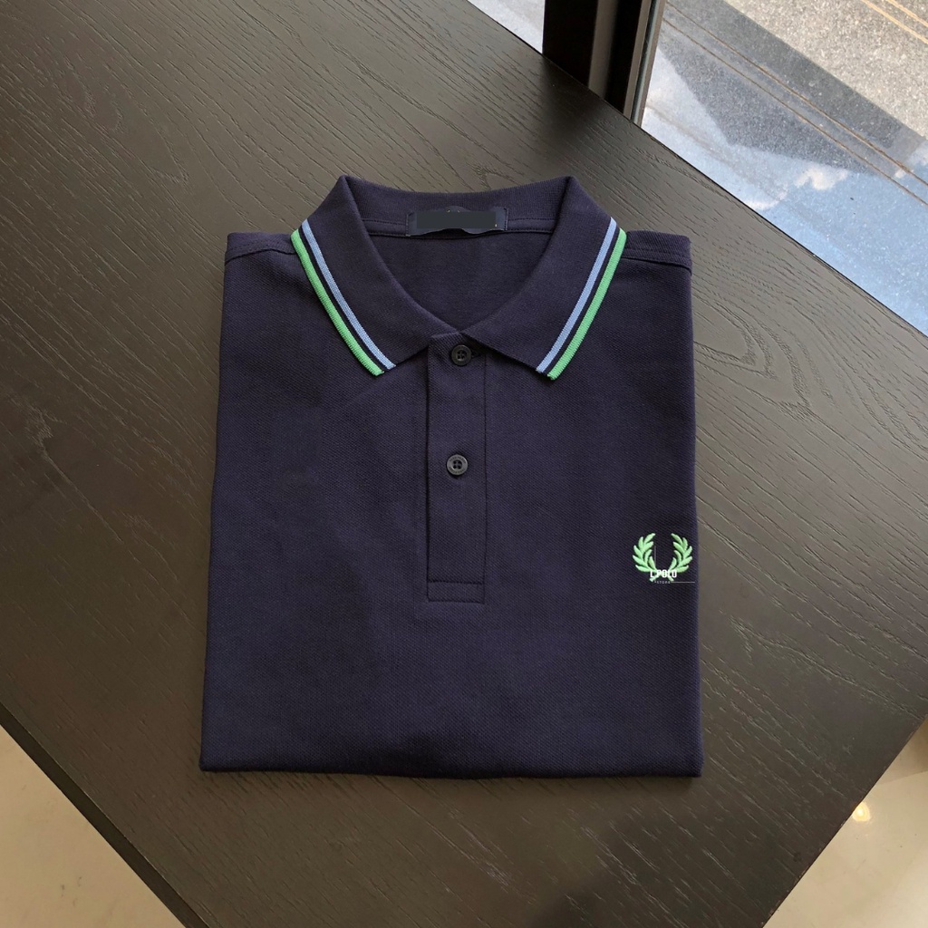 Áo thun Polo nam Fred phối viền dạ quang
