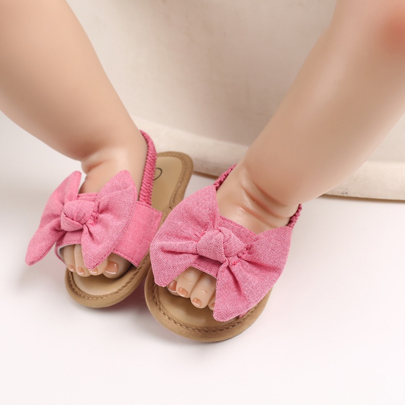 Giày tập đi đế mềm chống trượt đính nơ dễ thương cho bé gái