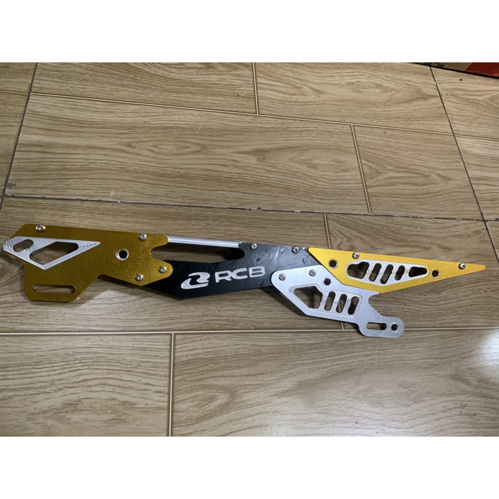 Che sên xe exciter 150 nhôm cnc màu vàng