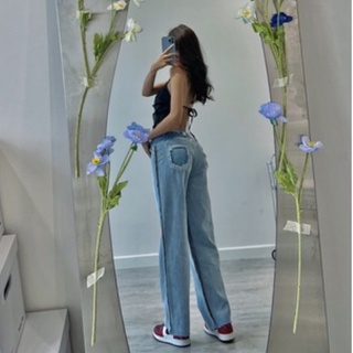 Quần jeans vắt sổ