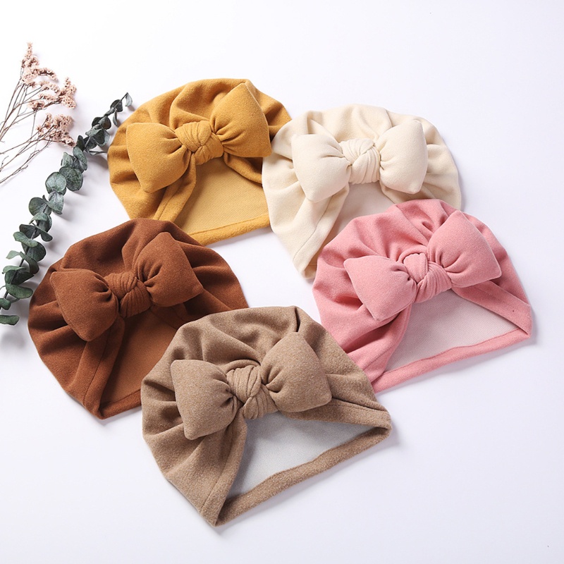 Mũ Trùm Đầu Giả Cashmere Đính Nơ Màu Trơn Giữ Ấm Mùa Thu Đông Cho Bé Trai + Gái