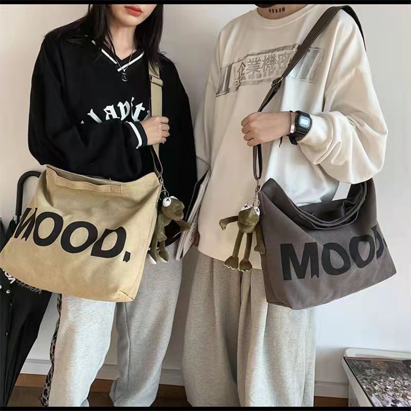 2022 mới cặp đôi túi đeo vai vải bố unisex túi xách đi làm và đi học Túi xách thời trang phiên bản Hàn Quốc dụng cụ thời trang túi tote dung tích lớn