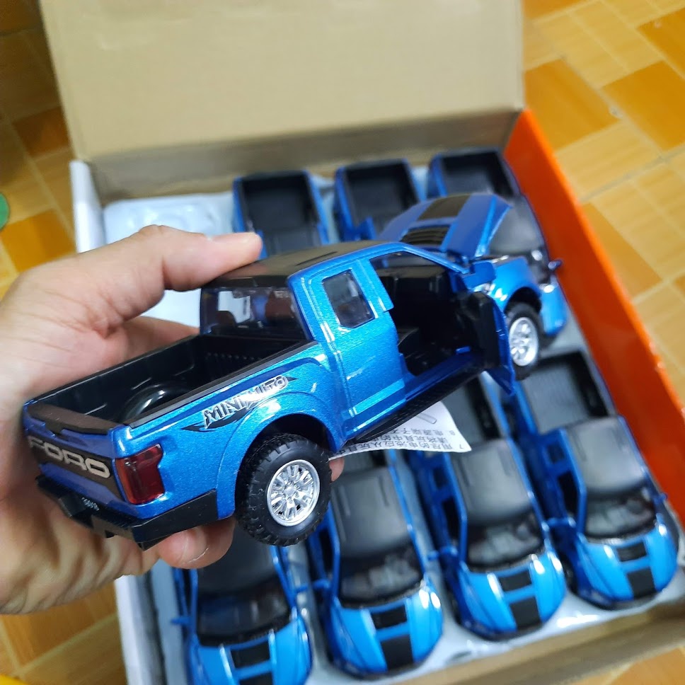 Xe mô hình ô tô Ford raptor F150 tỉ lệ 1:32 - Xe đồ chơi trẻ em bằng kim loại chạy cót có đèn và âm thanh mở được cửa