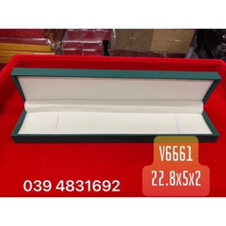 Hộp dài da màu xanh đựng dây chuyền, đồng hồ