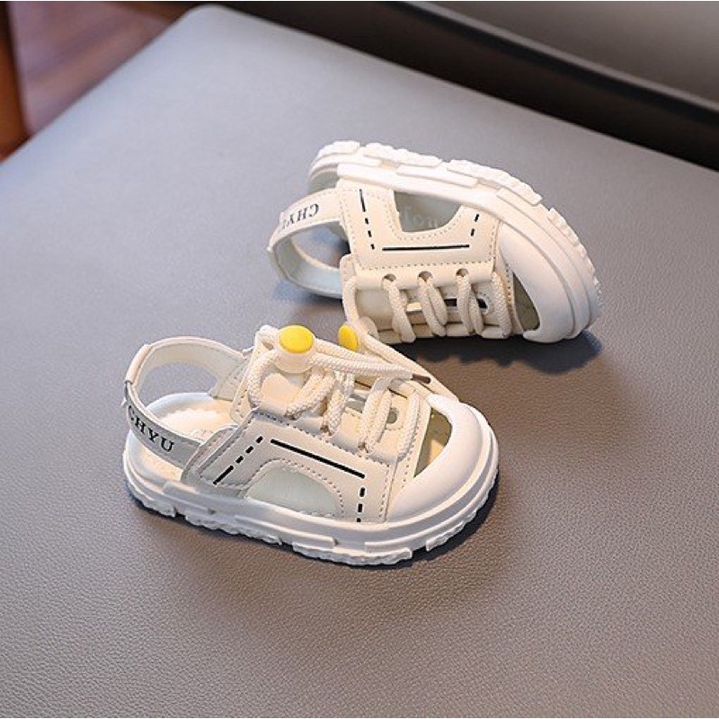 Sandal cho bé trai, bé gái quai dán dây rút độc đáo - dép quai hậu cho bé chống vấp da PU mềm M216(đen,trắng)(sz22-sz31)