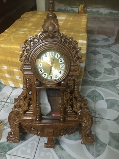 ĐỒNG HỒ GỖ MUN ĐUÔI CÔNG
