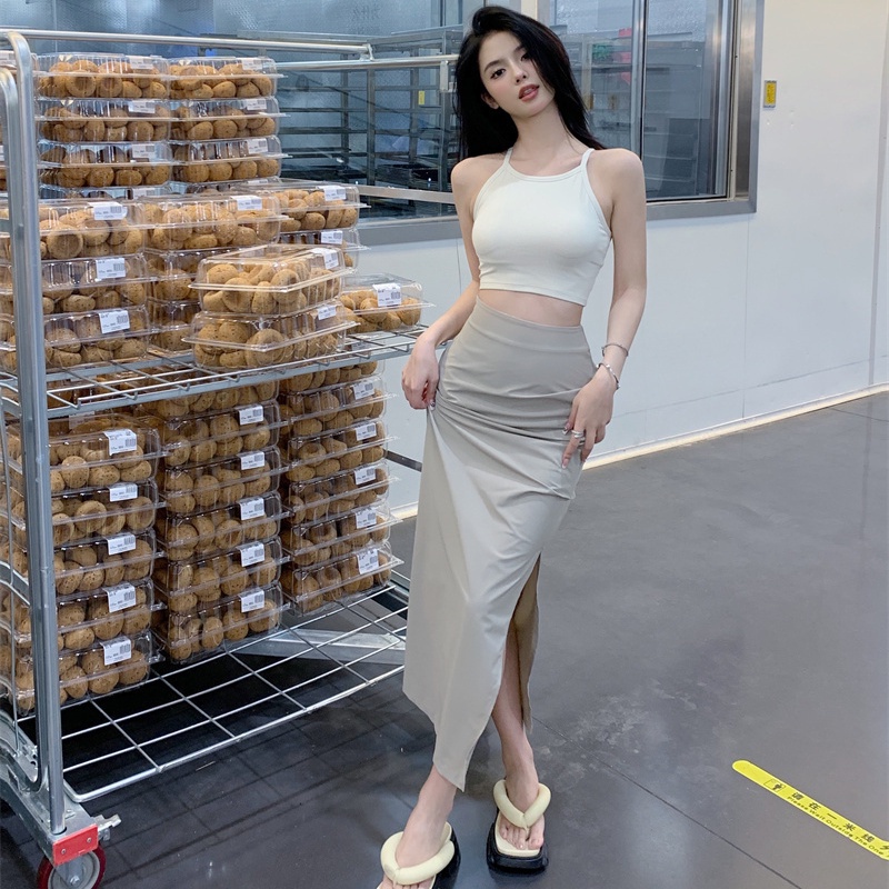 Set đồ COZOKC gồm chân váy xẻ tà lưng cao và áo không tay thời trang cho nữ