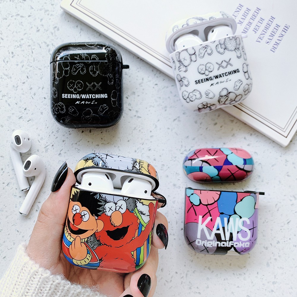 Vỏ bảo vệ hộp sạc tai nghe Airpods 1 / 2 mềm họa tiết Kaws Sesame Street kèm dây đeo