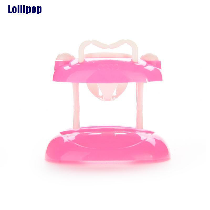 Đồ chơi tập đi bằng nhựa màu hồng dành cho nhà búp bê