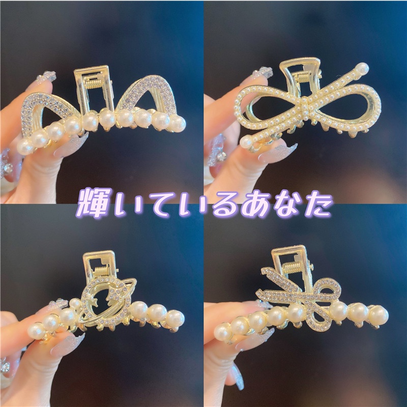 Kẹp càng cua hình chim công/ duôi cá/ trái tim/ hướng dương đính ngọc màu vàng kim