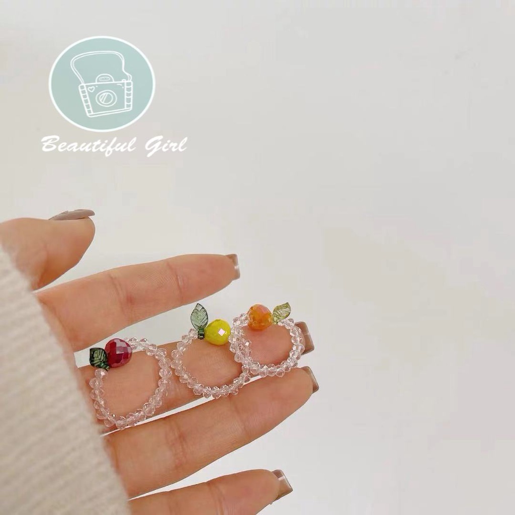 Nhẫn dạng vòng hạt xỏ pha lê trong suốt hình trái cây màu cam đỏ vàng co giãn dành cho nữ