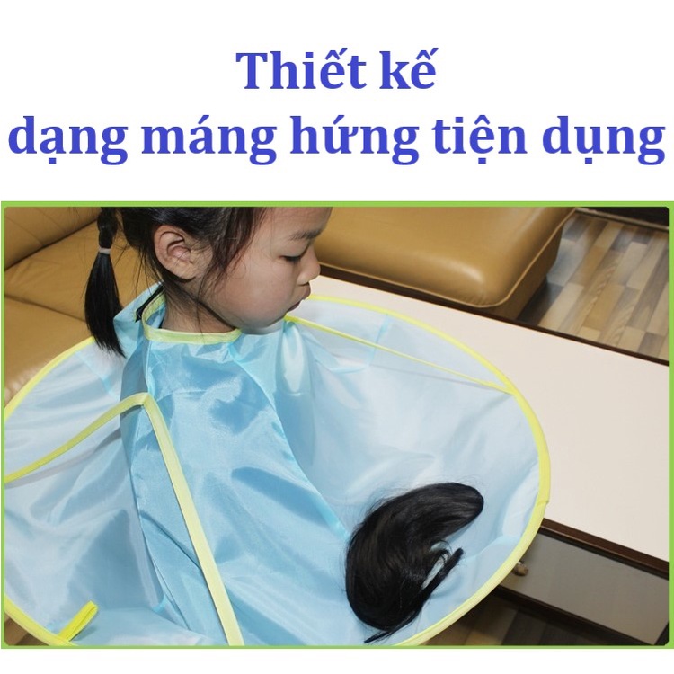 Áo choàng cắt tóc cho bé có máng hứng tóc tiện dụng. Không dính tóc lên người bé