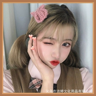 Kẹp tóc nơ len điệu đà