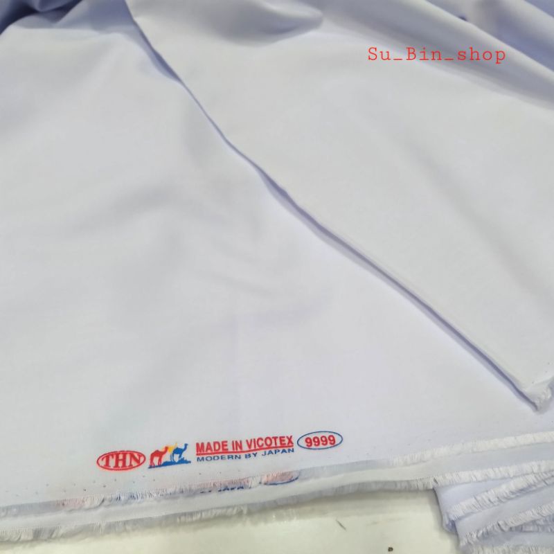 Vải Kate trắng giá rẻ may áo học sinh