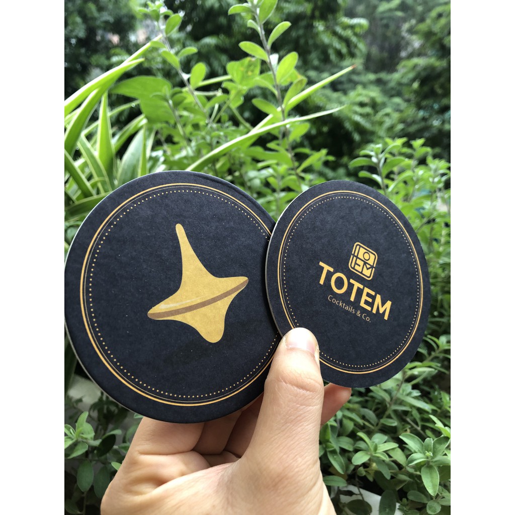 Lót ly giấy để bàn, miếng lót cốc giấy thấm nước in logo theo yêu cầu giá rẻ