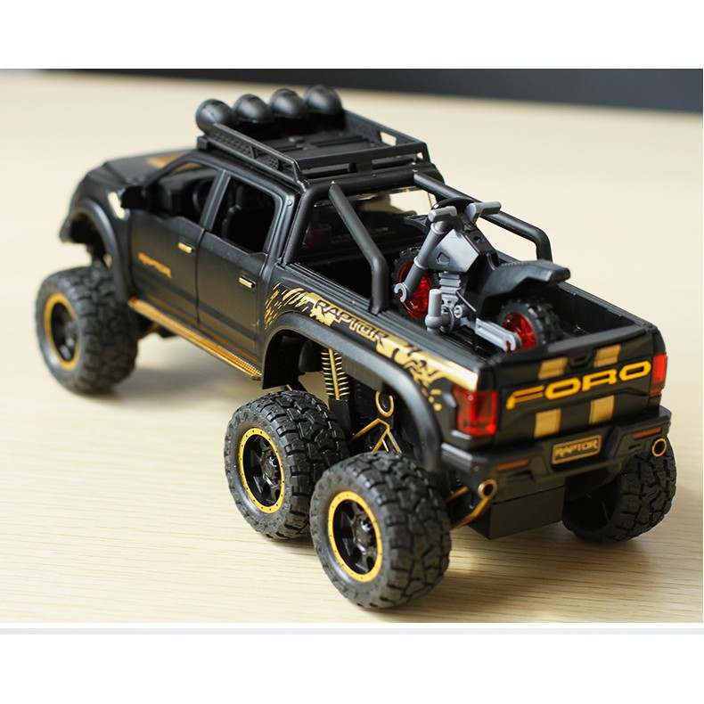 MÔ HÌNH XE Ô TÔ FORD F150 Beast Raptor 6x6 Offroad đúc Kim Loại - tỷ lệ 1:28