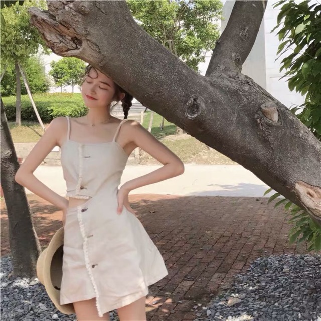 Váy zz hai dây dáng ôm xẻ ngang  chát bò only màu trắng sữa
