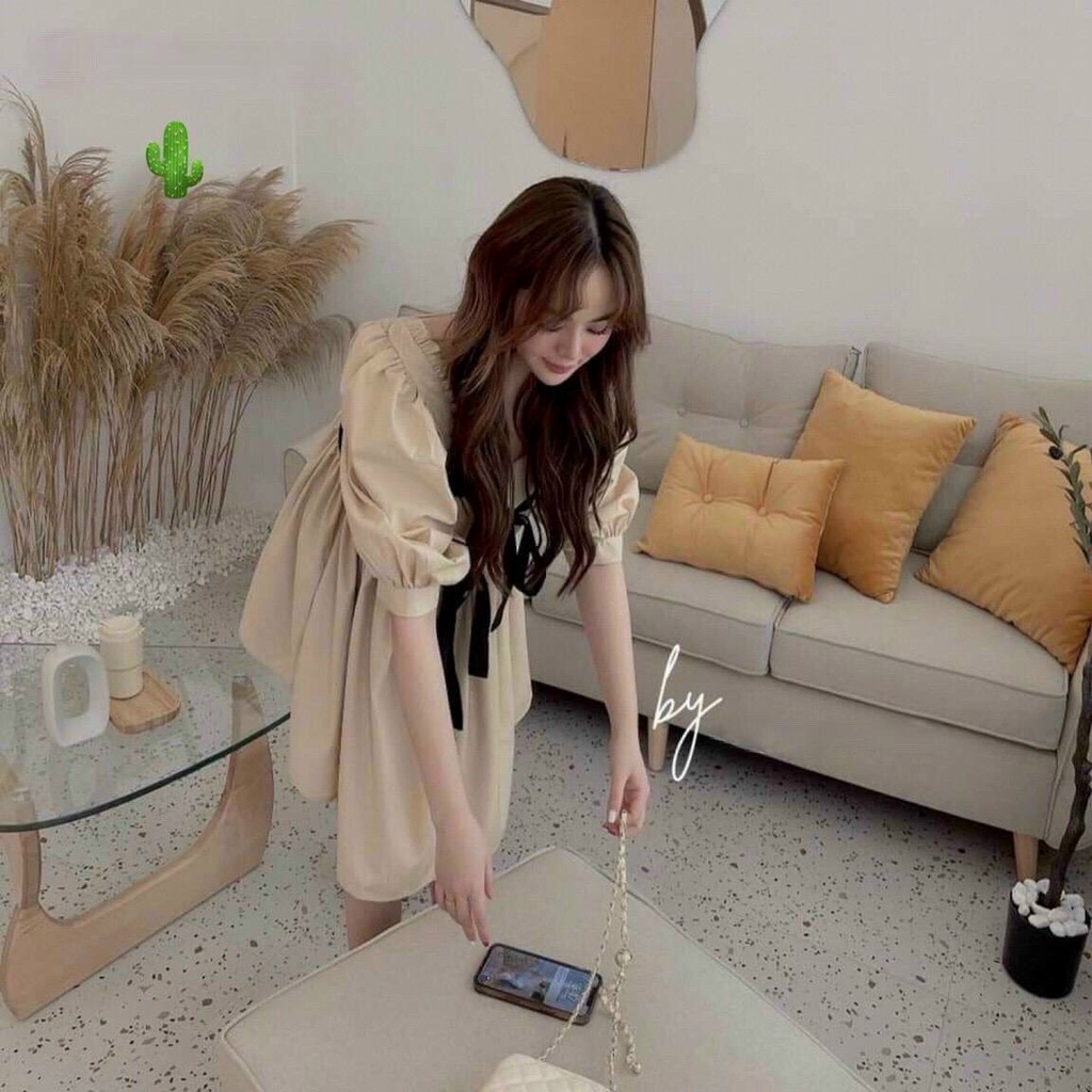 Đầm babydoll dáng xòe nơ trước cực xinh , chất kate mềm mịn
