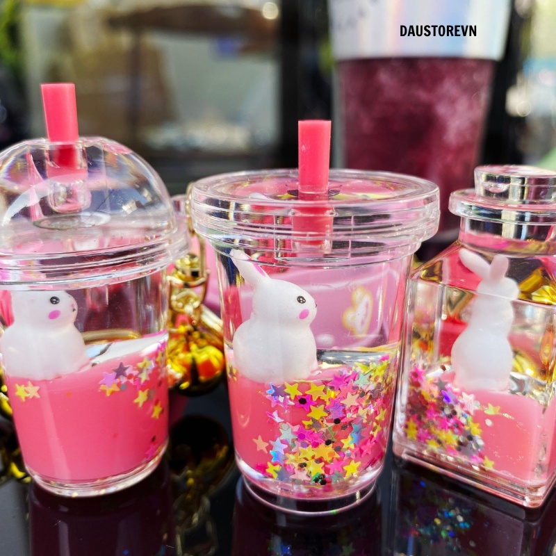 Móc khóa thỏ con chuyển động nhảy nhót trong móc khóa , chuyên treo túi xách , balo _ DAUSTORE