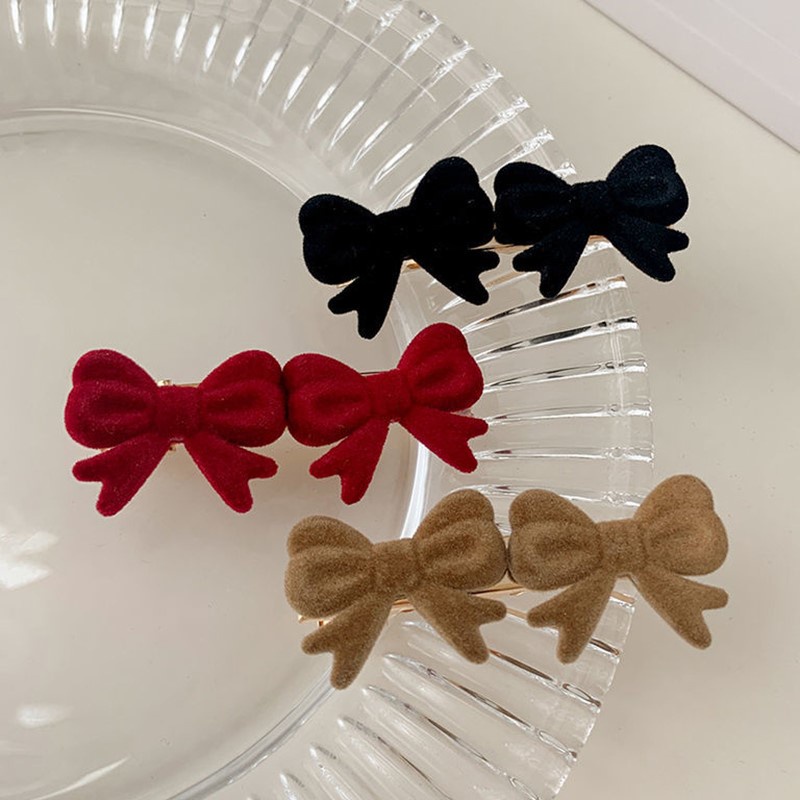 Kẹp tóc hình nơ xinh xắn cho nữ