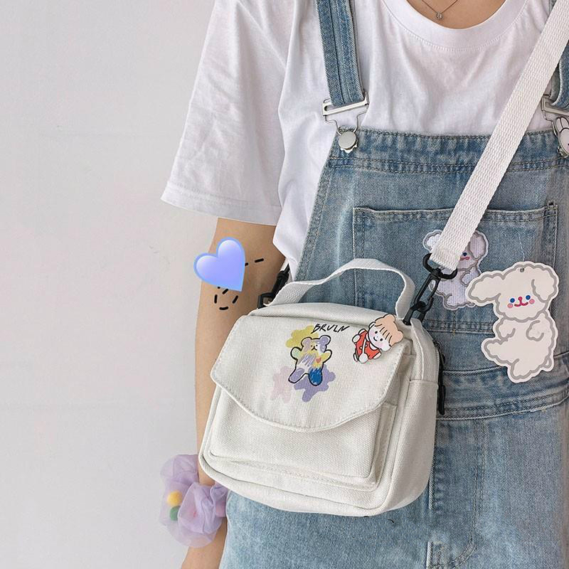 Túi đeo chéo vải canvas họa tiết gấu hoạt hình dễ thương dành cho nữ