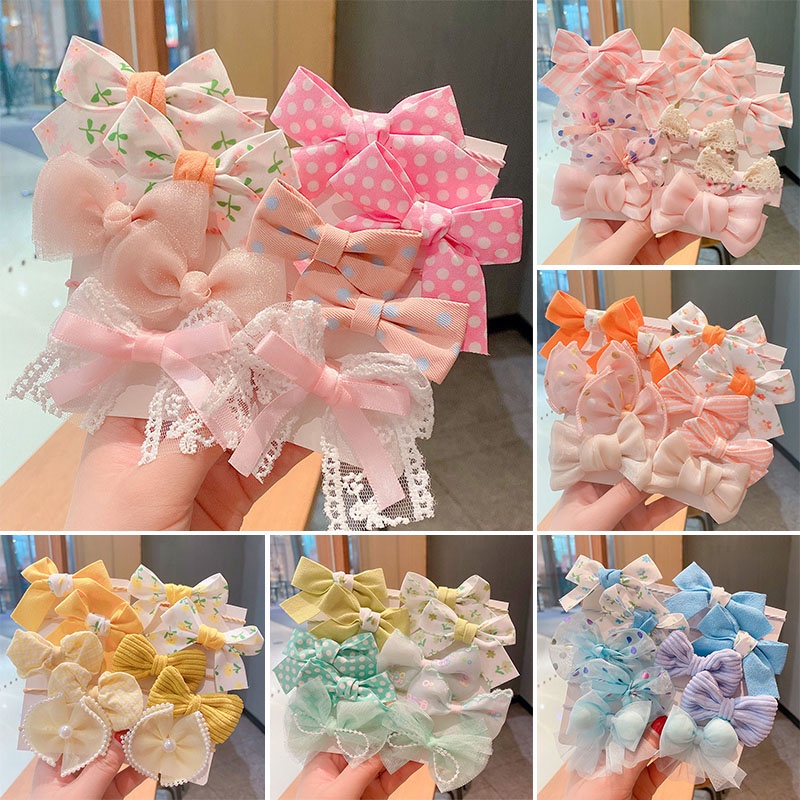 Set 10 Dây Buộc Tóc Co Giãn Đính Nơ Dễ Thương Cho Bé Gái