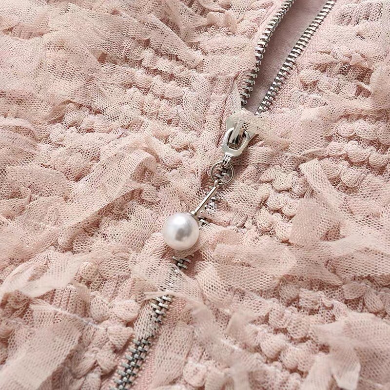 Đầm tua rua Dzzit