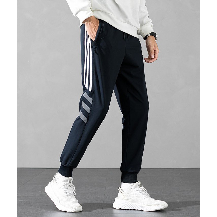 Quần Jogger Nam bo gấu phối sọc phong cách thể thao, chất liệu Polysiter dày đẹp | BigBuy360 - bigbuy360.vn