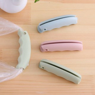 Tay cầm silicon chống đau tay khi cầm túi tiện ích, đồ dùng thông minh