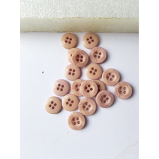Set 4 cúc áo màu hồng guốc nhạt