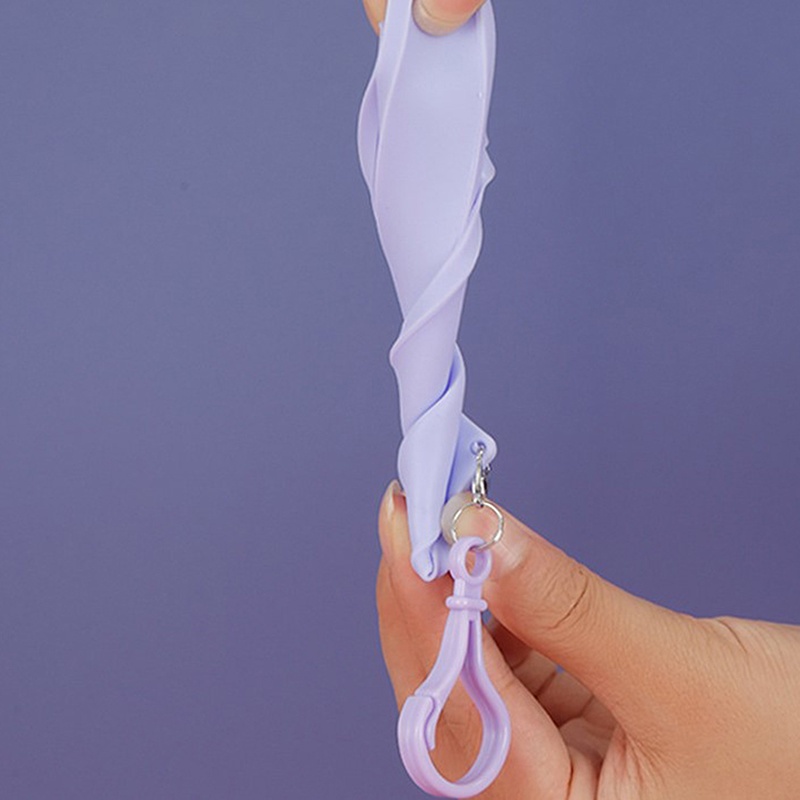 Vỏ bọc chai xịt nước hoa bằng silicone kèm móc khóa