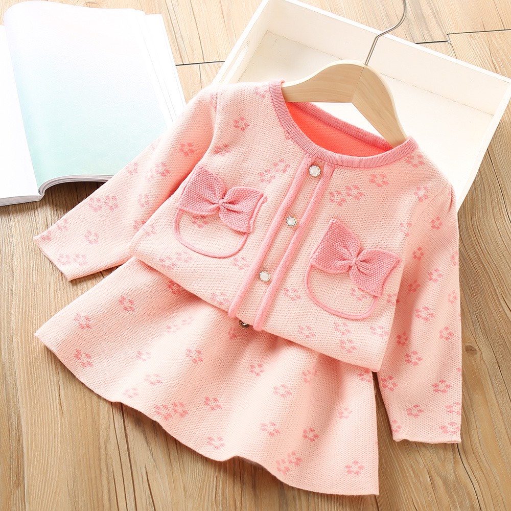 Váy bé gái họa tiết hoa đào 2 nơ túi ngực áo croptop và chân váy 8-30kg XHN1092
