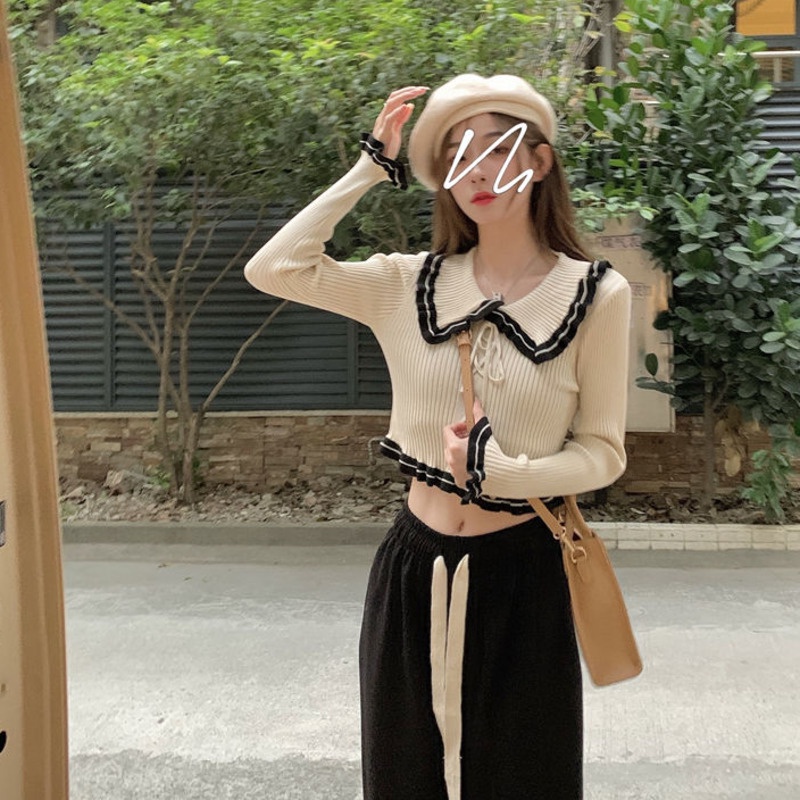 Áo len ngắn có cột dây với đường cắt tỉa thời trang mùa xuân độc đáo cho nữ