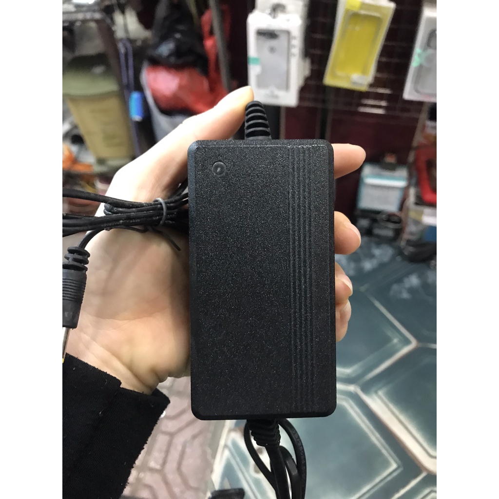 HÀNG MỚI Adapter BỘ ĐỔI Nguồn điện 9V 1A CÓ ĐEN BÁO