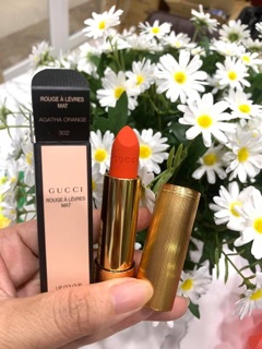Son gucci 302 đỏ cam