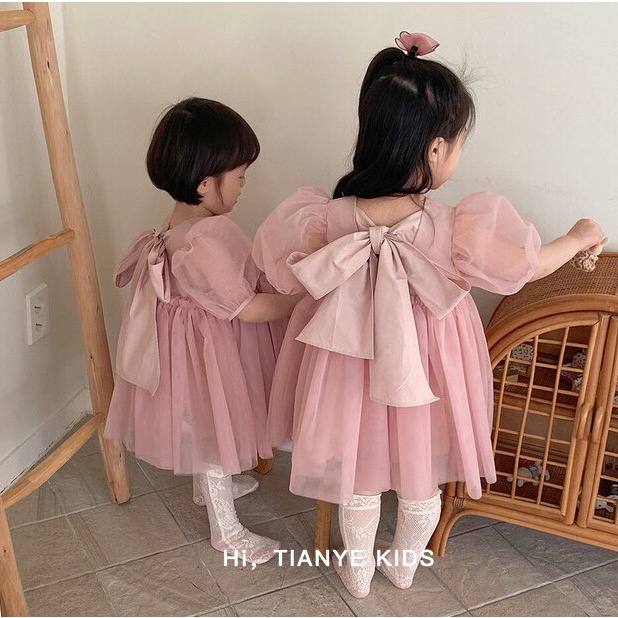 Đầm Hồng Phối Nơ Sau Lưng Cho Bé Gái Size 80-120