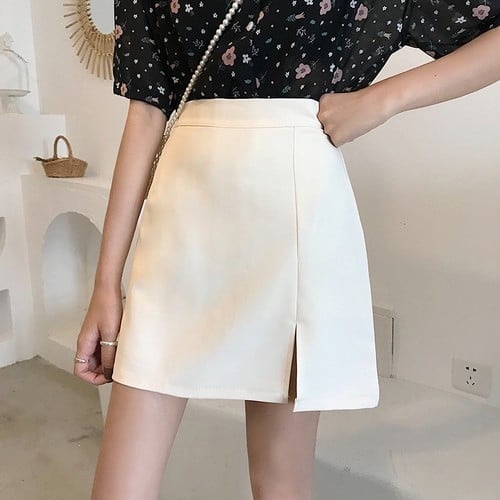 Chân váy chữ A ngắn xẻ cạnh màu trắng có quần trong(sẵn size)