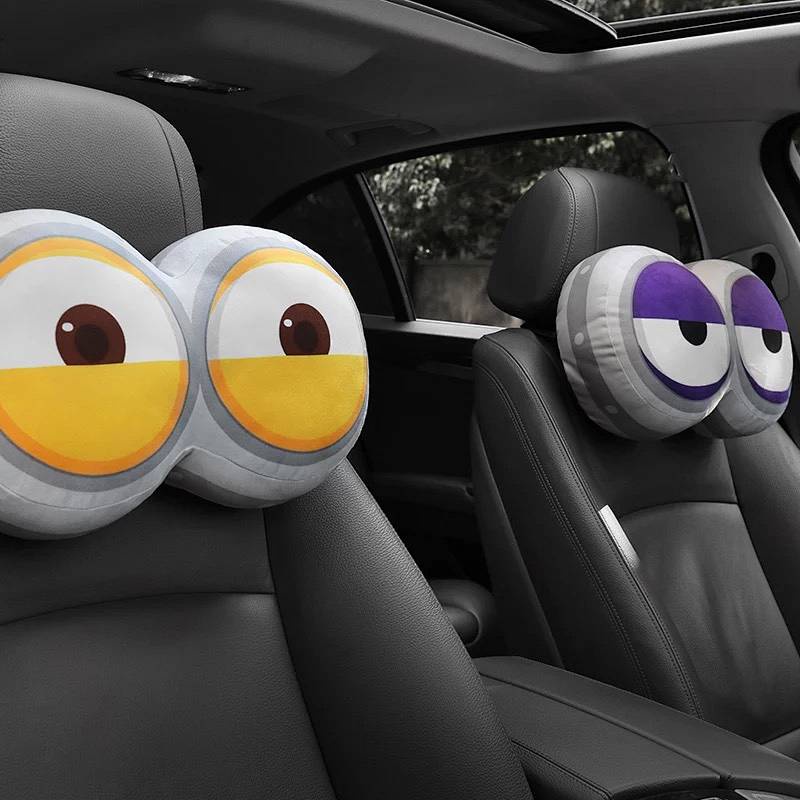 Gối tựa đầu hình đôi mắt Minion dễ thương cho xe hơi